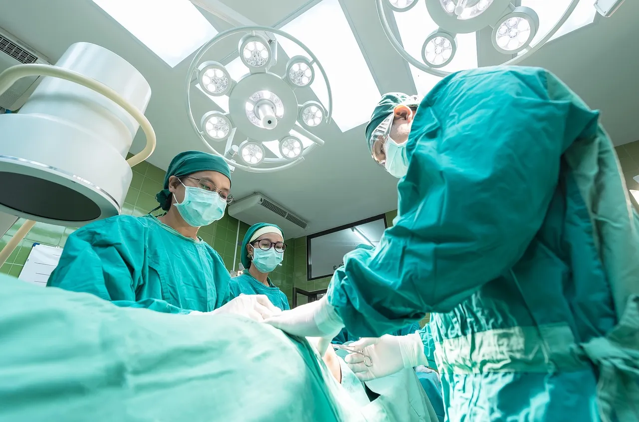 A surgical team at work in an operating theatre