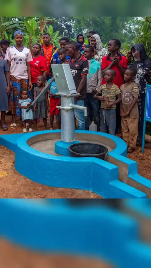 Water flowing at a completed hand pump